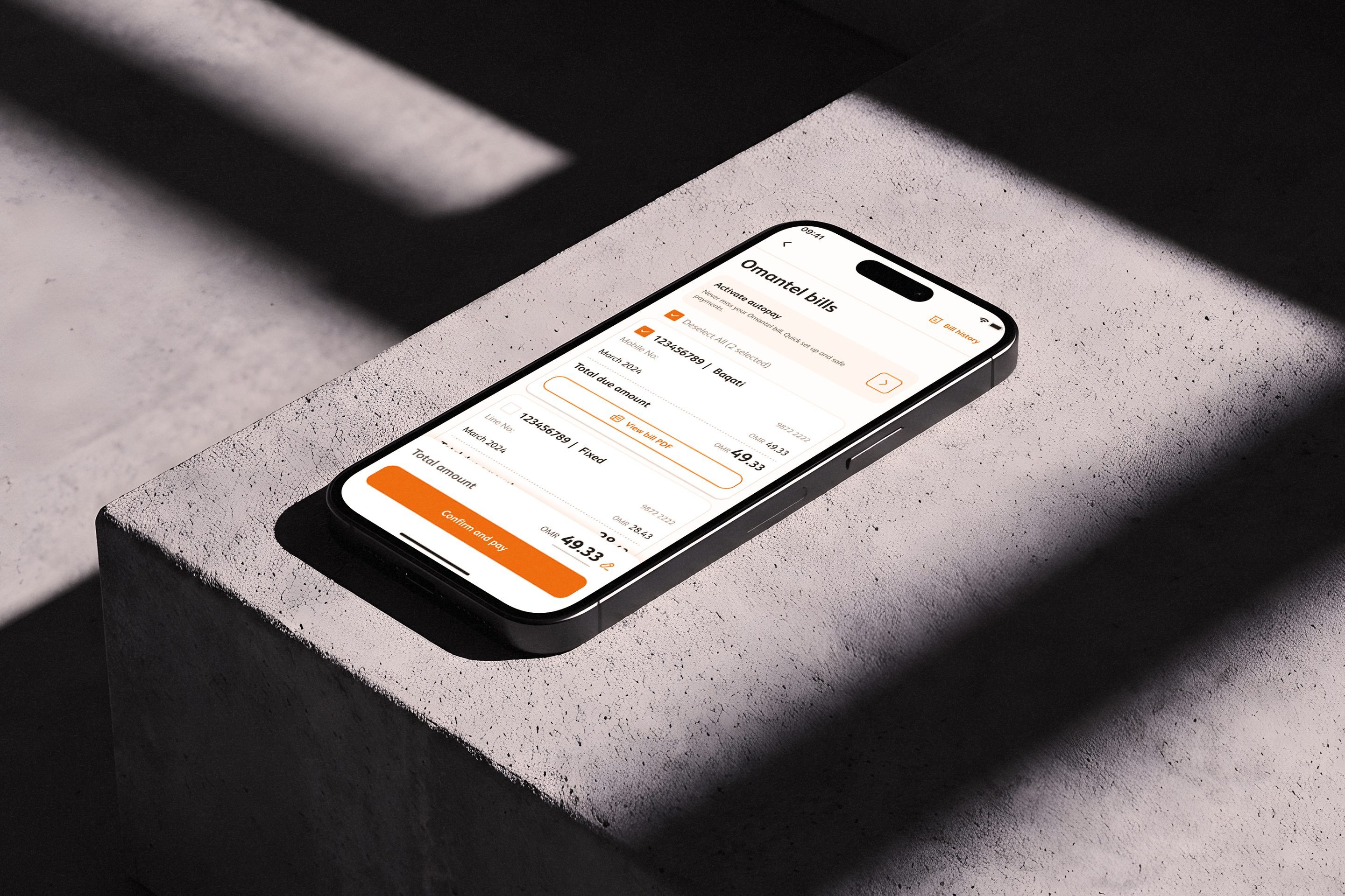Omantel bill payment app on a concrete surface